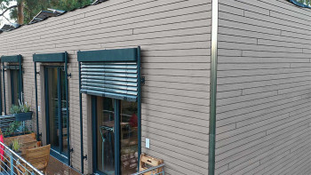 planeo Fassado - Latte WPC en losange revêtement de façade gris pierre