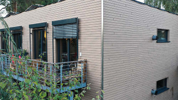 planeo Fassado - Latte WPC en losange revêtement de façade gris pierre